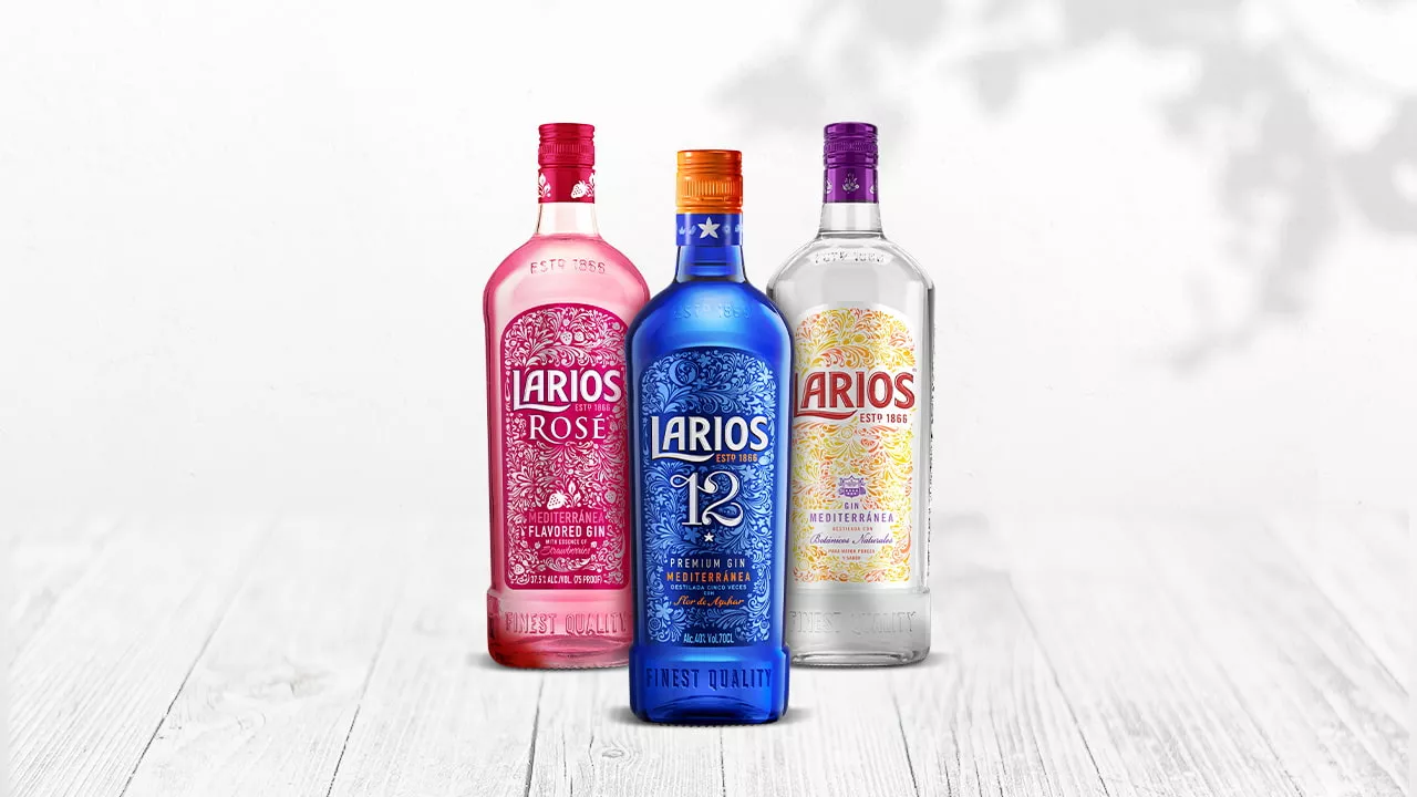 PLP category card 3 Larios bottles on white wood background